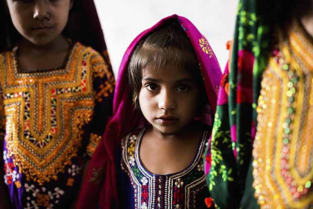 29. Four year old Benazir attends class with boys and girls of d