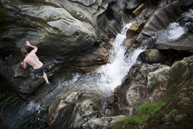 Man Climbs a Waterfall
