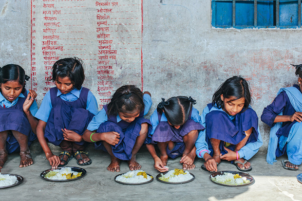 Children having their Mid-Day Meal in a school in Bettiah, Bihar