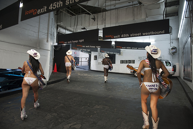 naked cowboys and cowgirls head out to times square to perform