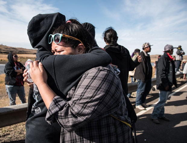 young-lakota-woman-cries-at-front-lines